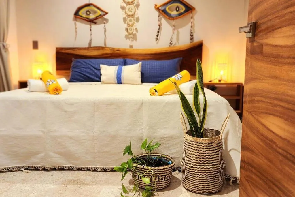 Bedroom, Bed in Follow to dream in Tulum!