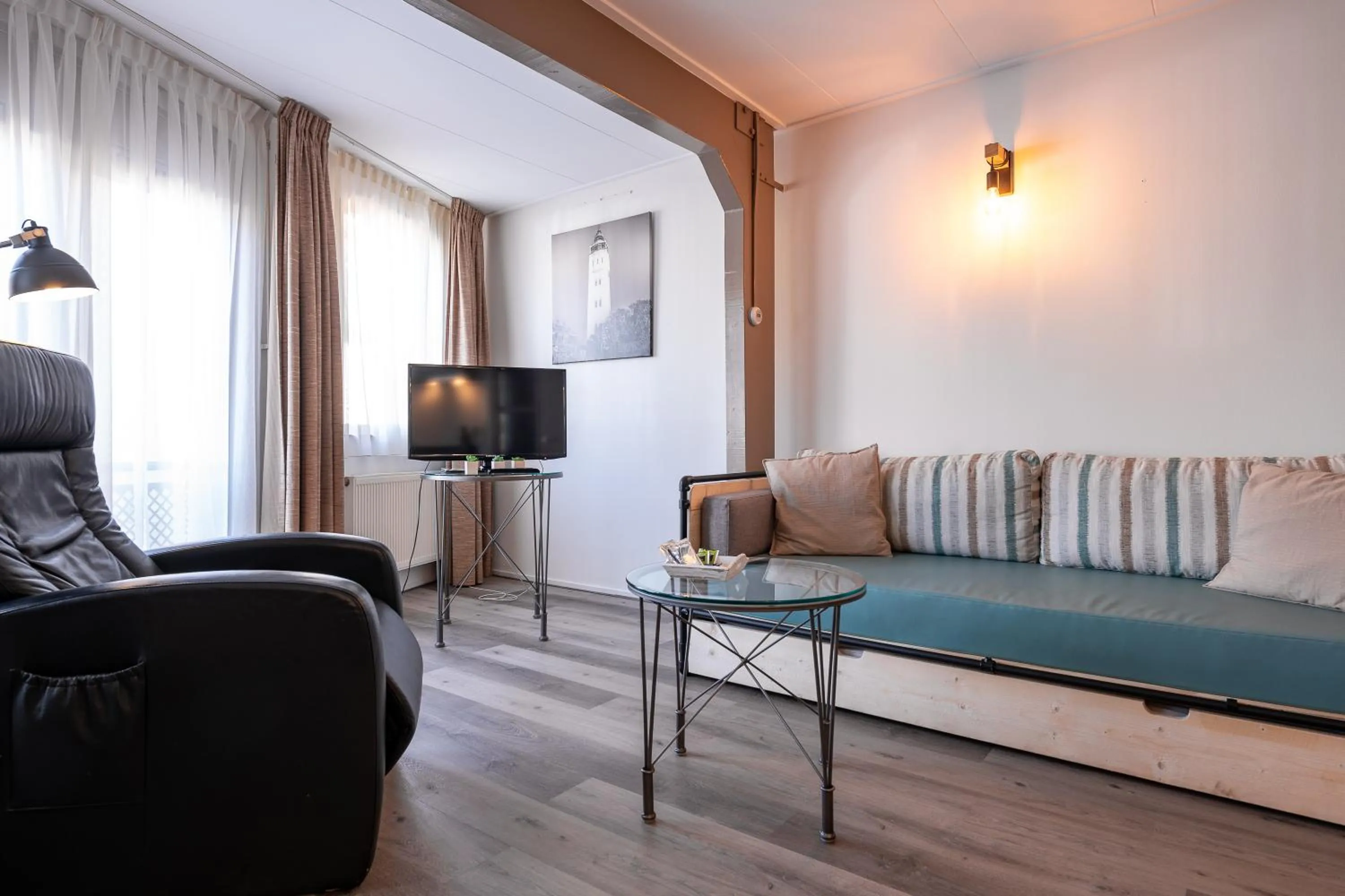 Seating area in Hotel Almenum - het sfeervolle stadslogement -