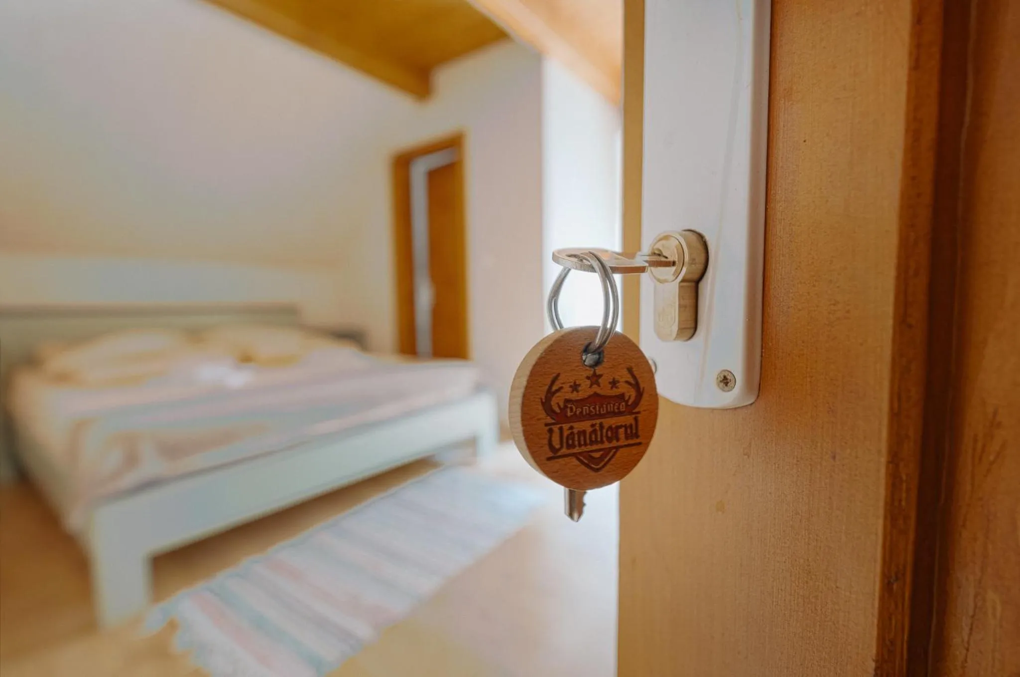 Photo of the whole room, Bed in Pensiunea Vanatorul