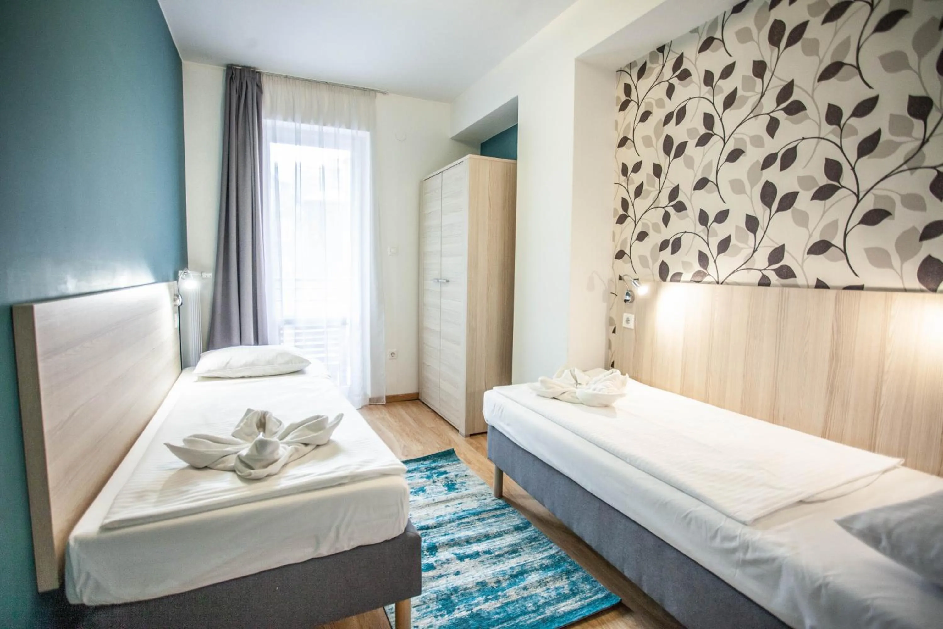 Bed in Maple Tree Budget Apartments