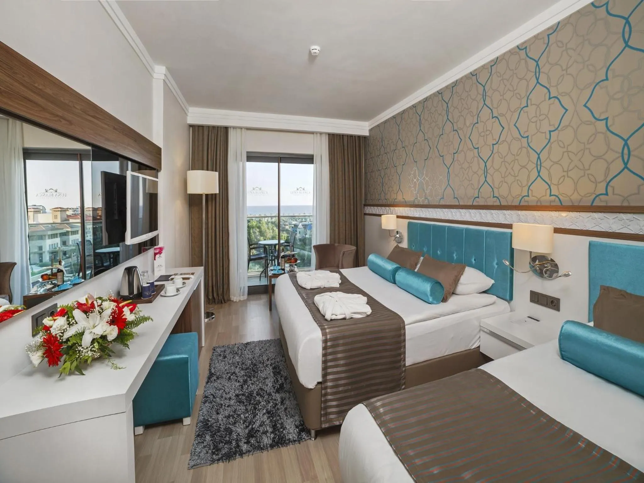 Bed in Luna Blanca Resort & Spa