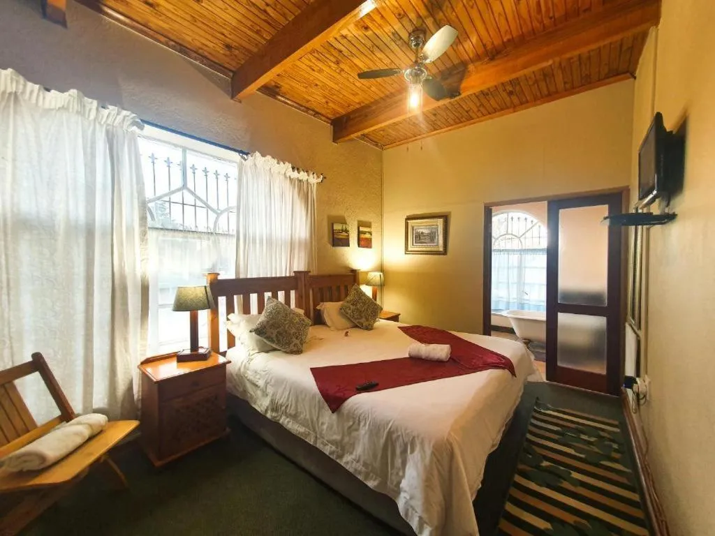 Bed in Just Tiffany Guest House & Conference Facility