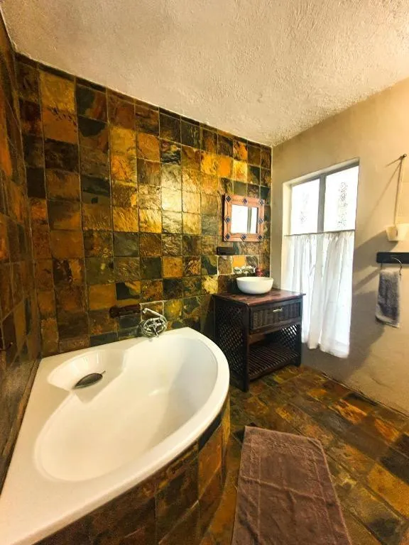 Bathroom in Just Tiffany Guest House & Conference Facility