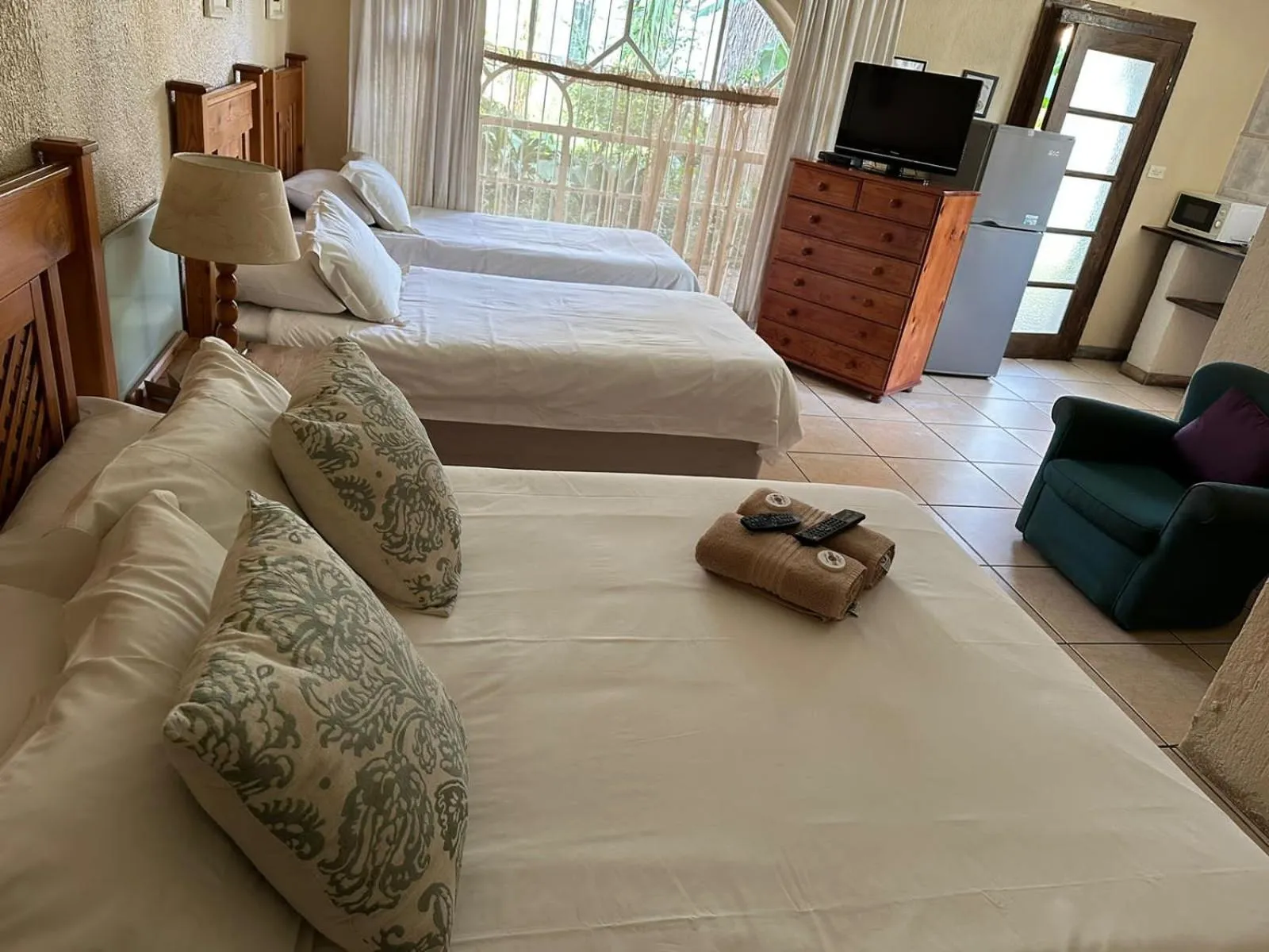Bed in Just Tiffany Guest House & Conference Facility