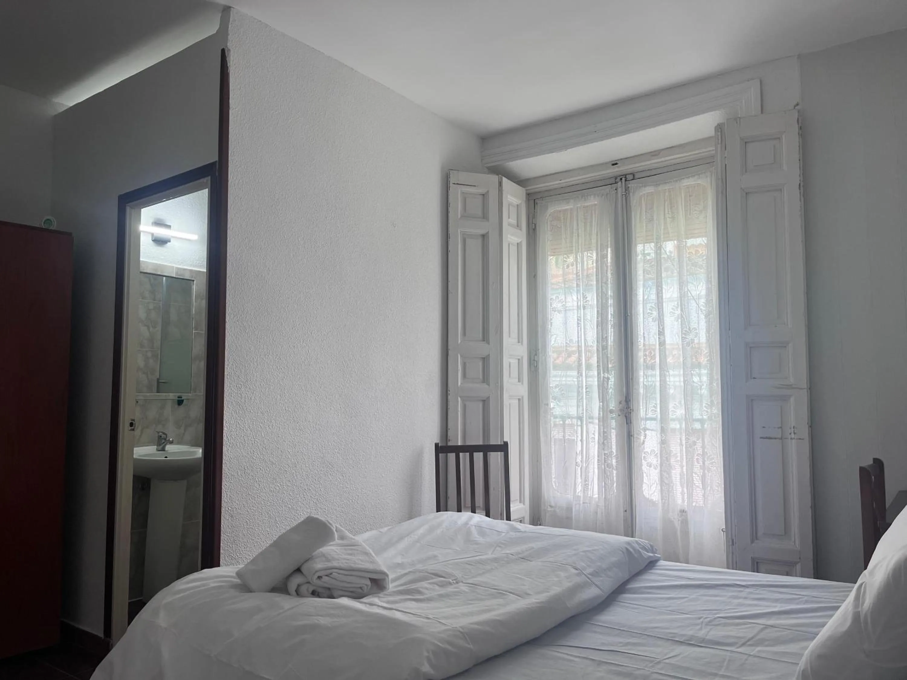 Photo of the whole room, Bed in Hostal Alonso No Limit Madrid