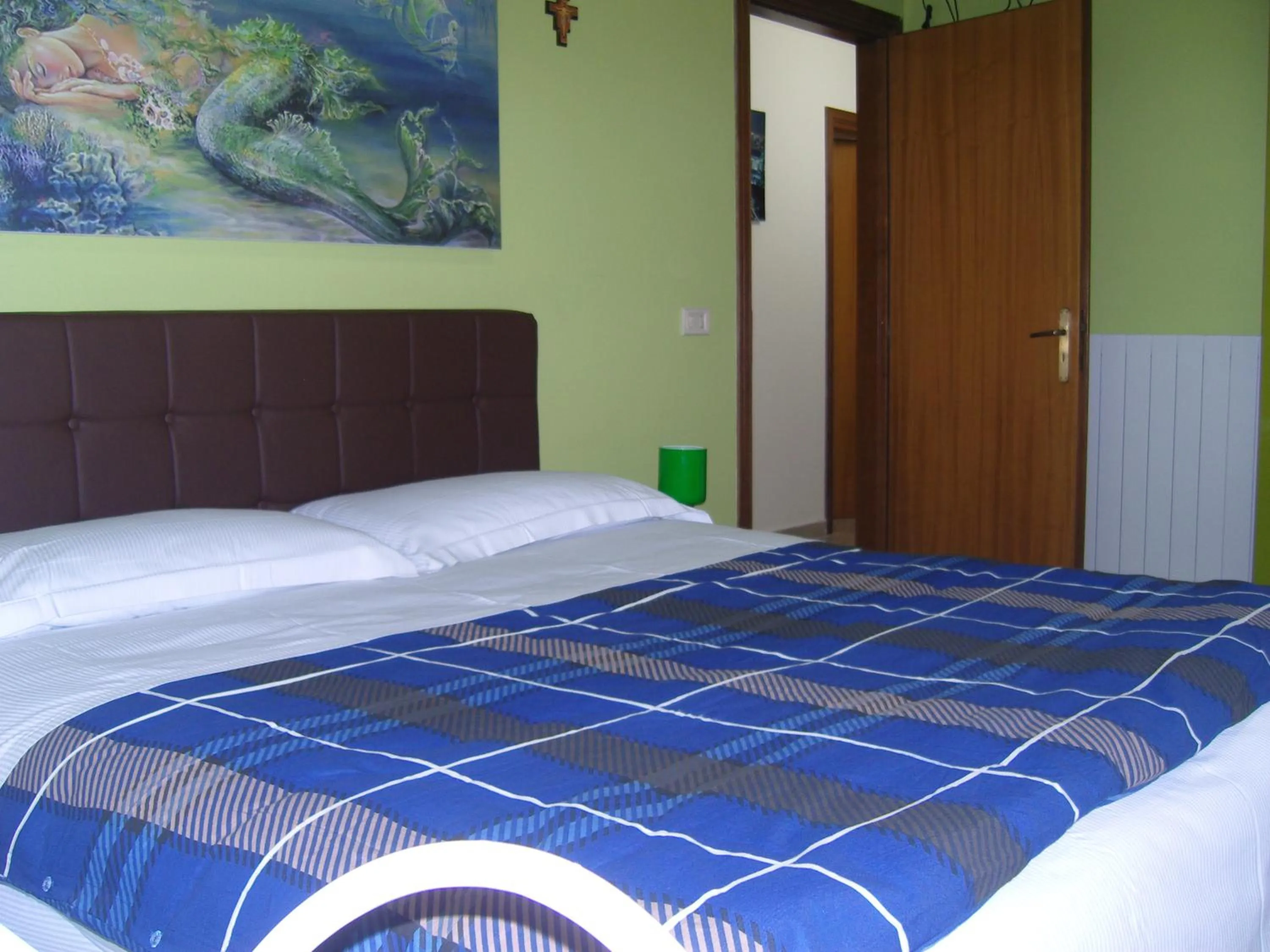 Bed in Le Sirene Bed and Breakfast