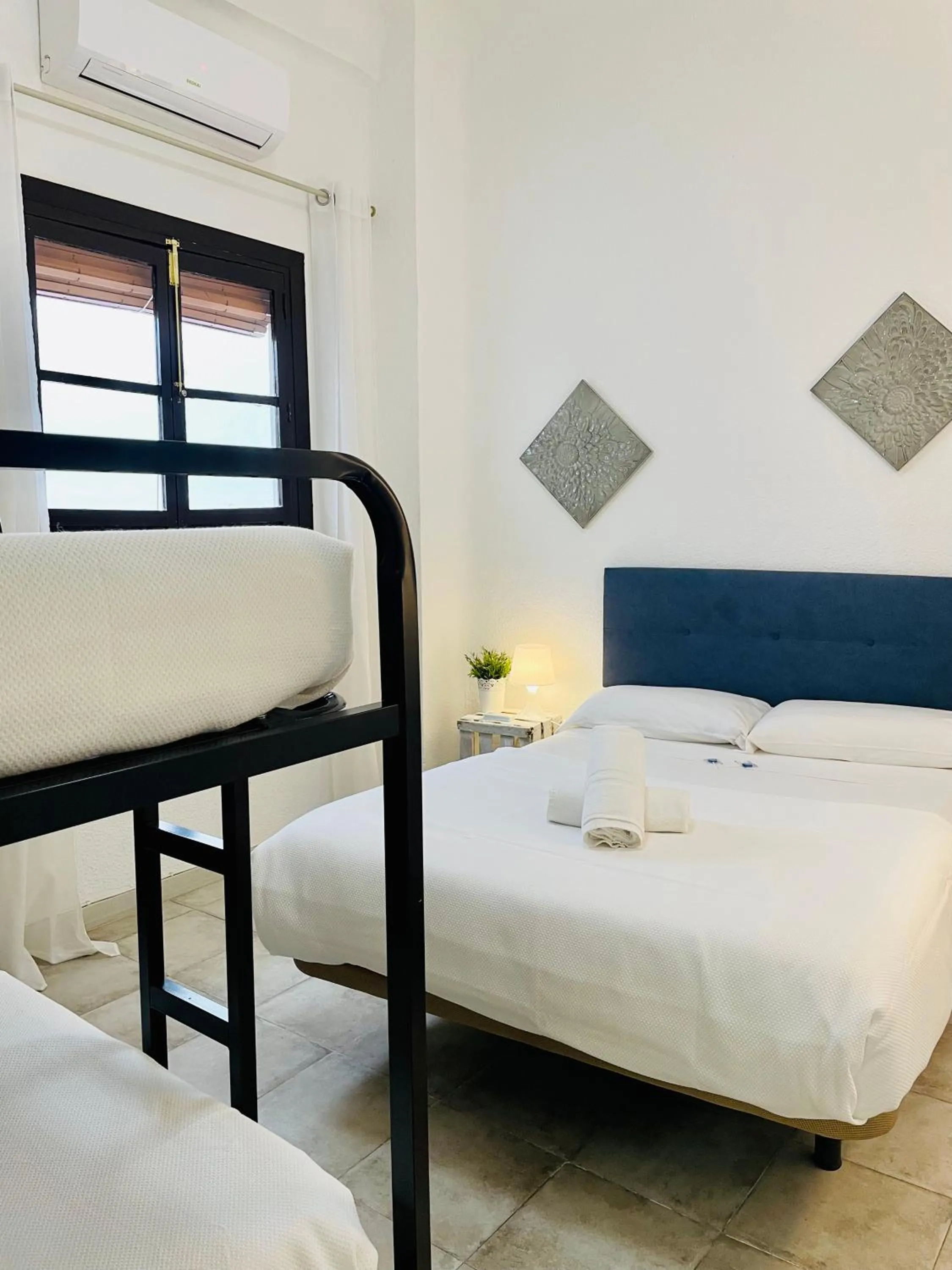 Family, Bed in Pension Venecia Gomerez