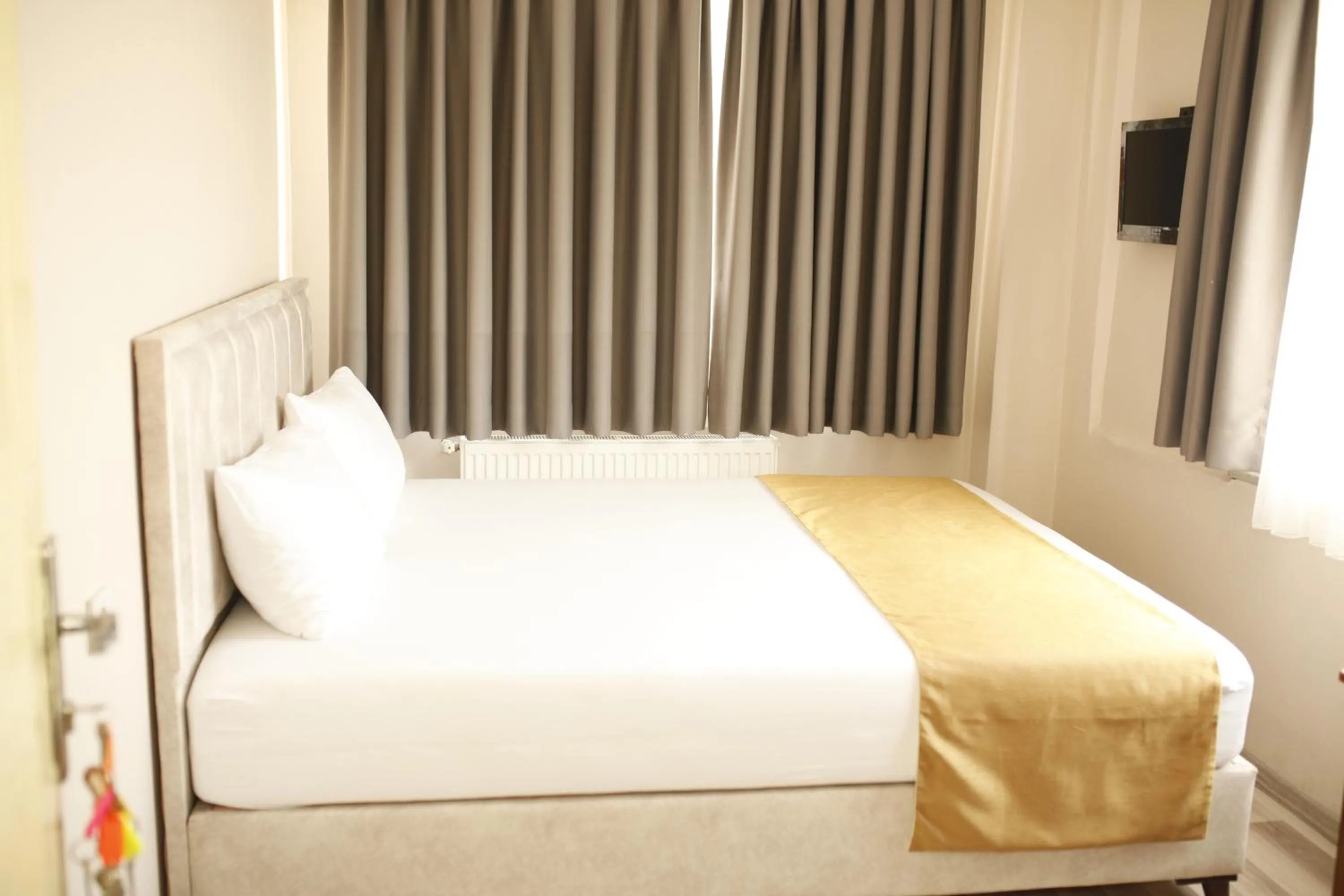 Bed in Birlik Apart Hotel