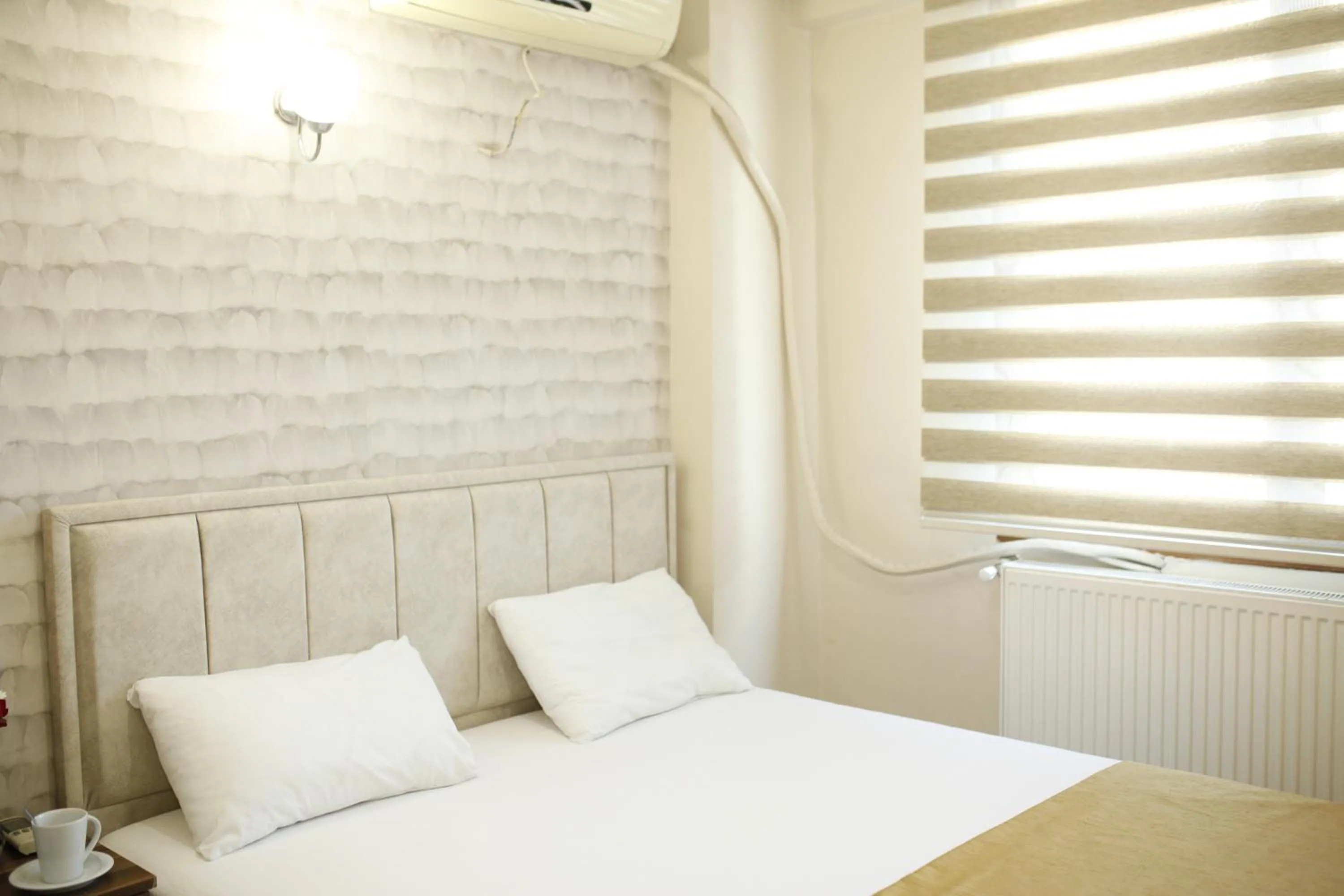 Bed in Birlik Apart Hotel