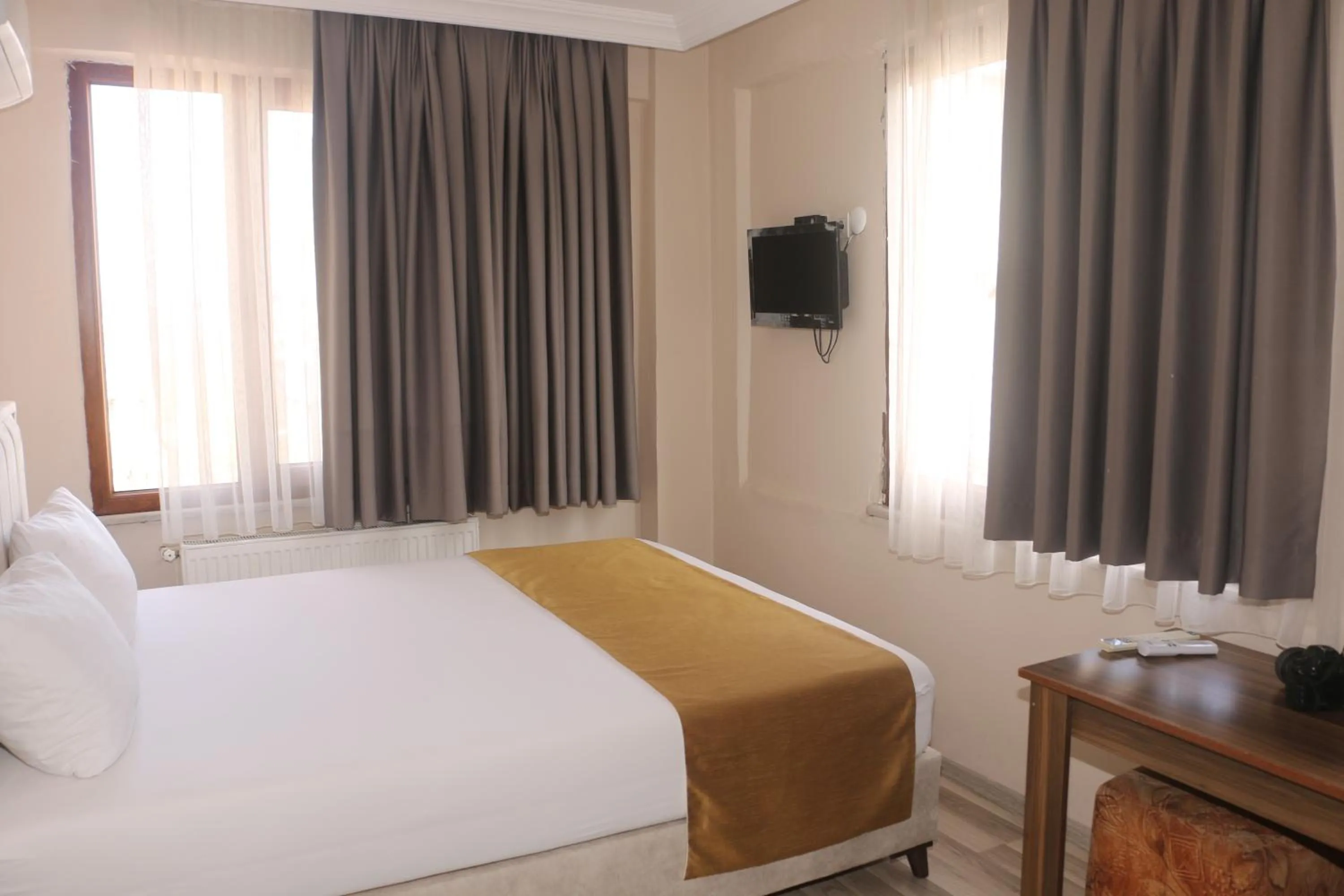 Bed in Birlik Apart Hotel