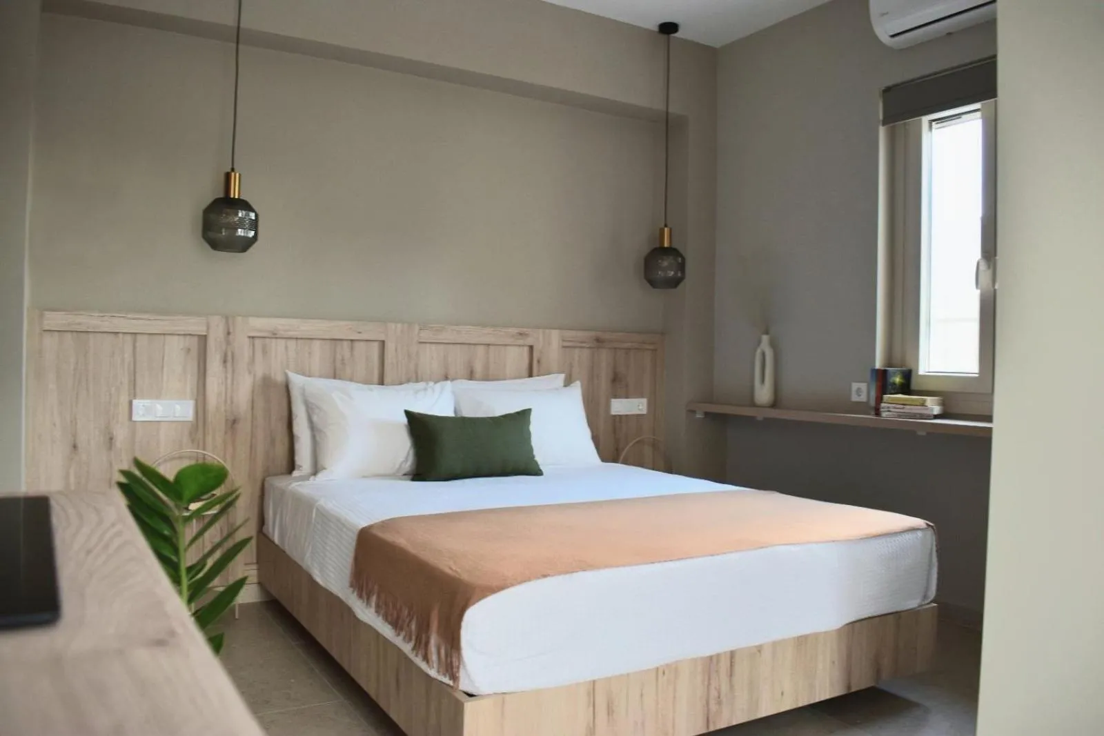 Bed in Limeria studios & maisonettes