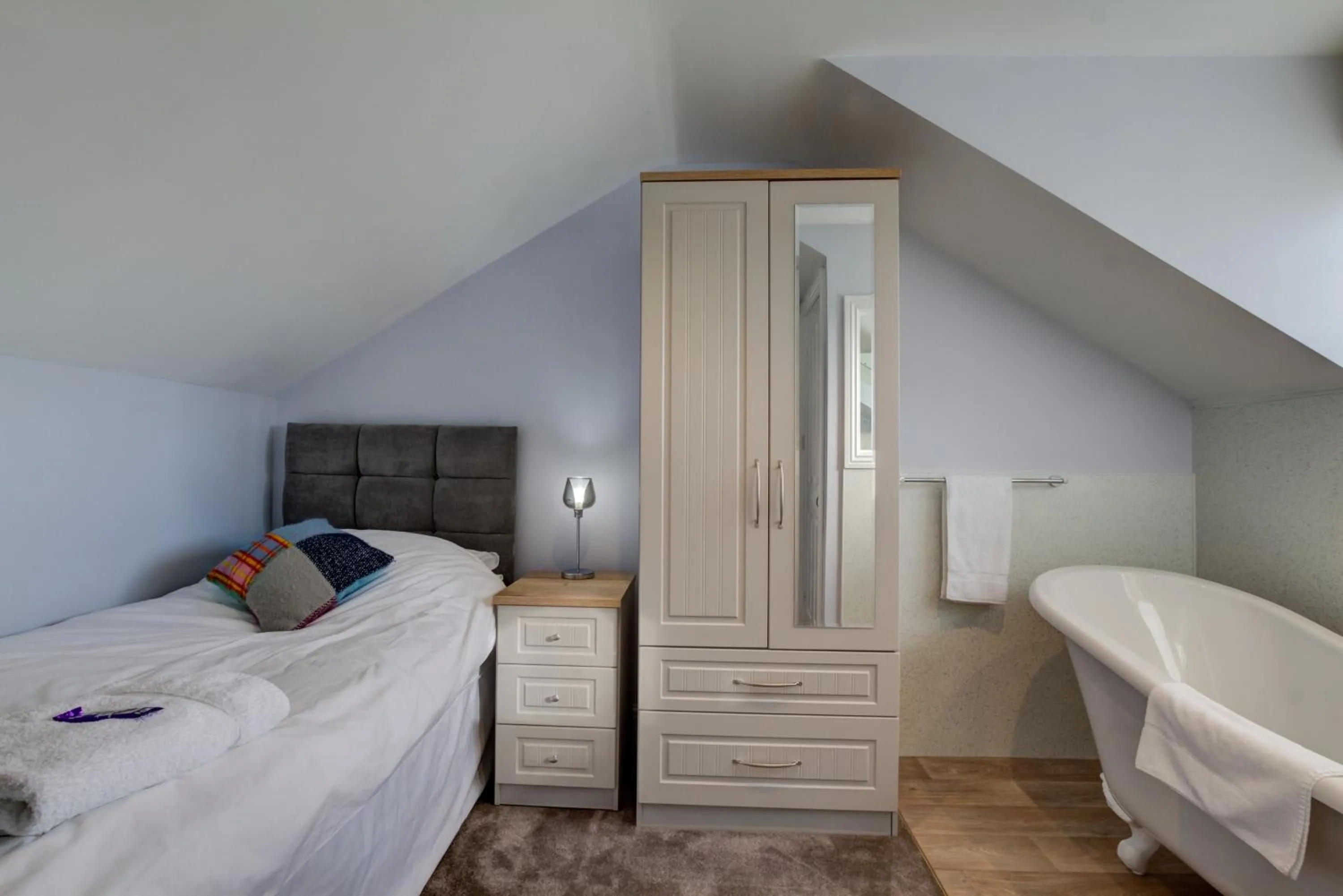 Bed in Sunrise Guest House