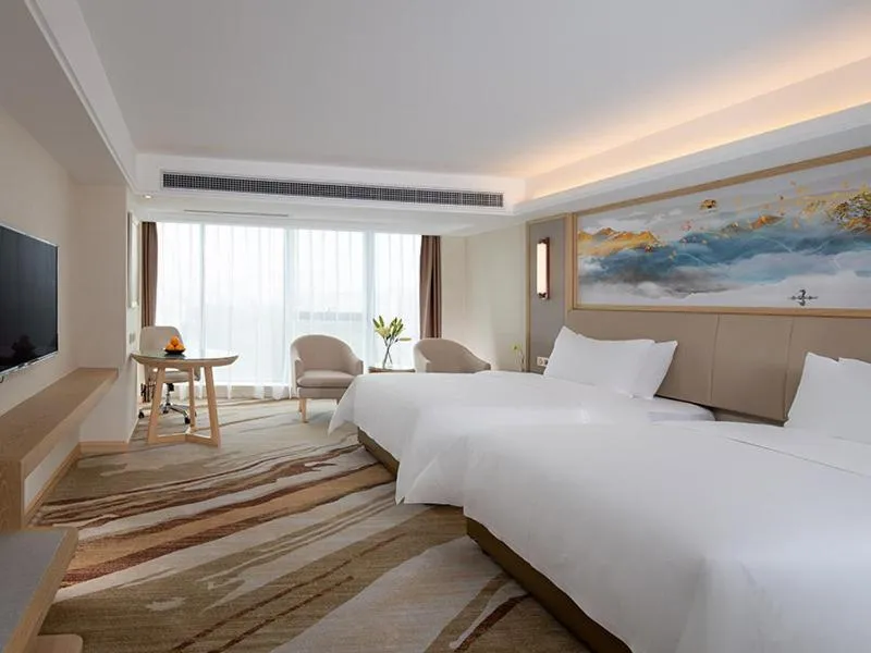 Bed in Vienna International Hotel South Gate of Shenzhen International Convention and Exhibition Center