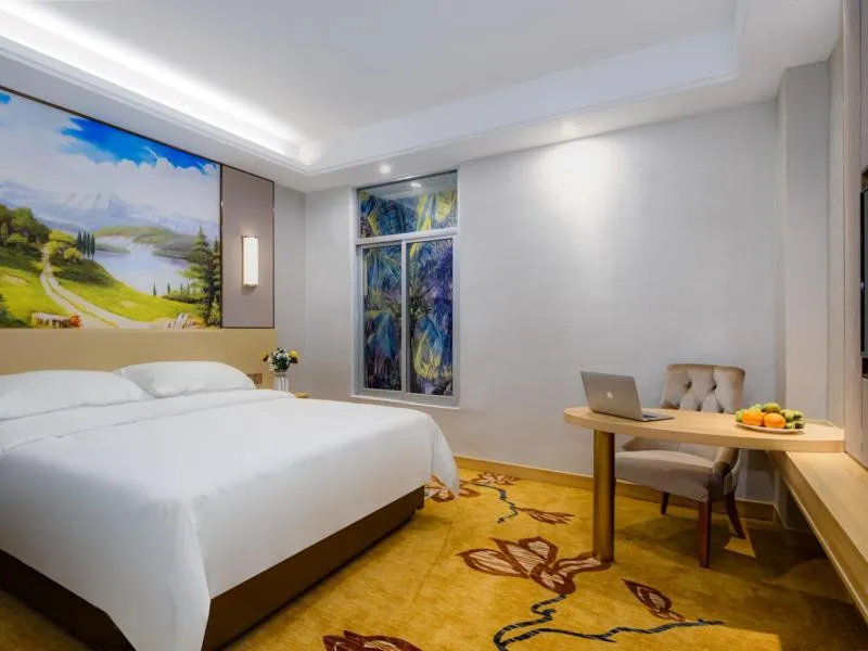 Bed in Vienna International Hotel Fujian Quanzhou Jinjiang Airport