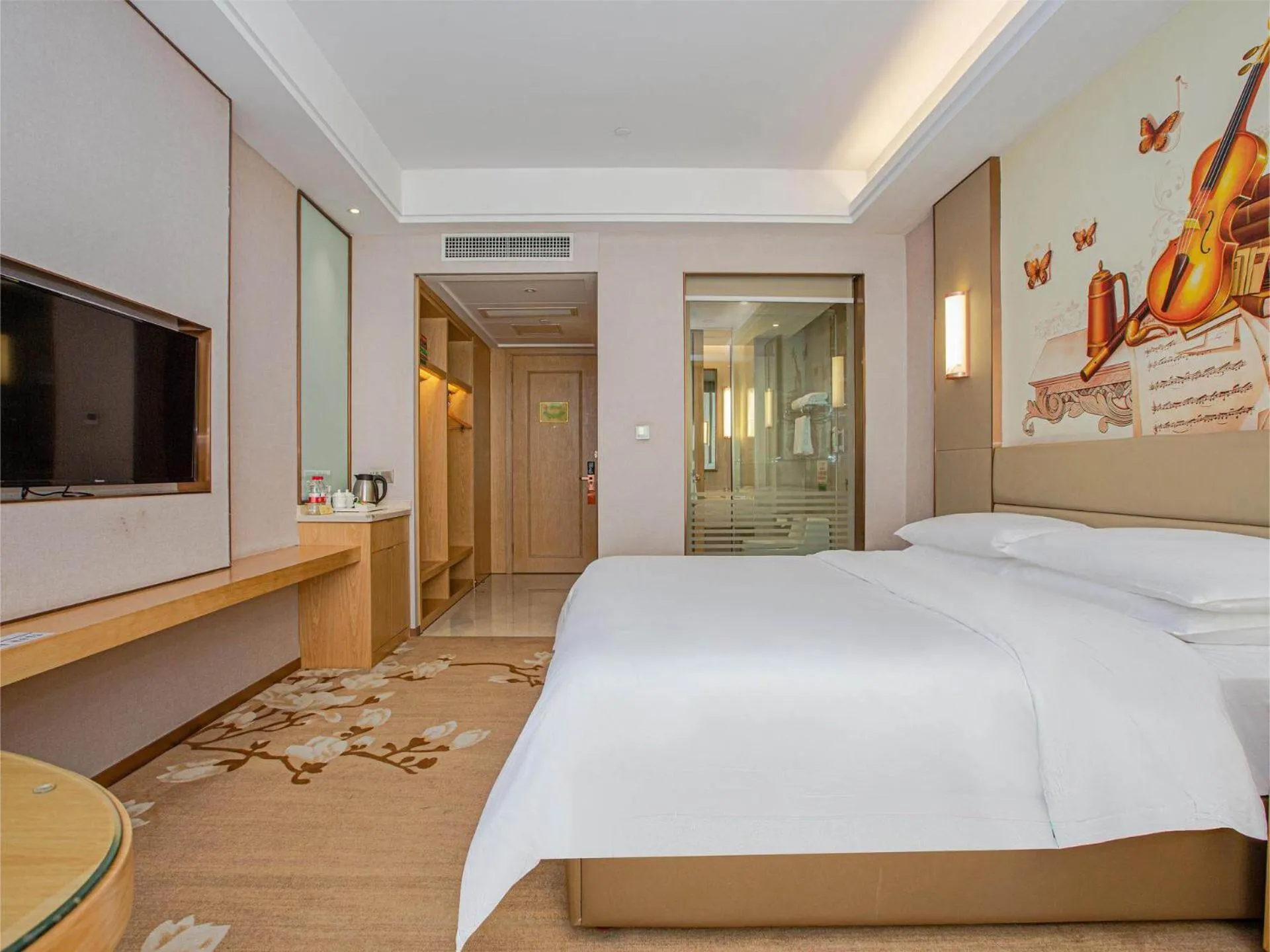 Bed in Vienna International Hotel Nanchang Qingshan Lake Wanda Plaza