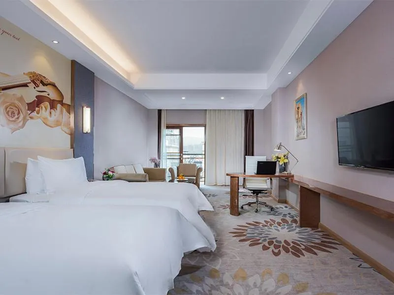 Bed in Vienna International Hotel Ganzhou Longnan