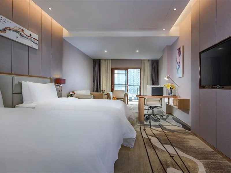 Bed in Vienna International Hotel Ganzhou Longnan