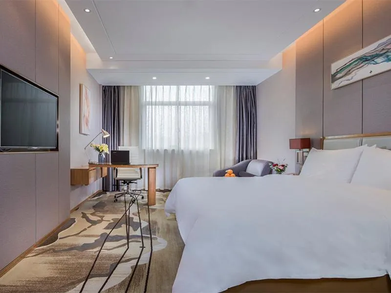 Bed in Vienna International Hotel Ganzhou Longnan