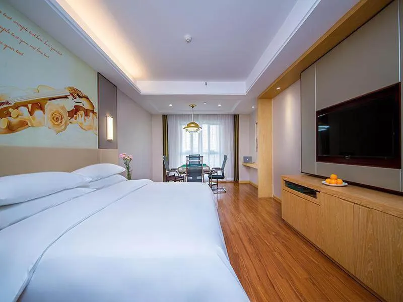 Bed in Vienna International Hotel Yichang Gezhouba Sanxia Culture Tiandi