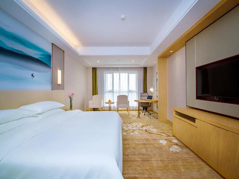 Bed in Vienna International Hotel Yichang Gezhouba Sanxia Culture Tiandi