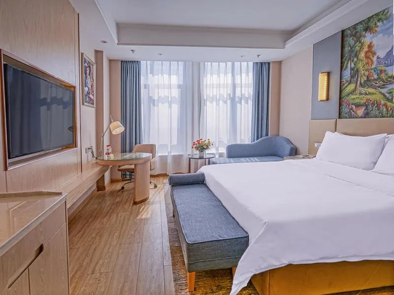 Bed in Vienna International Hotel Chongqing Ranjiaba