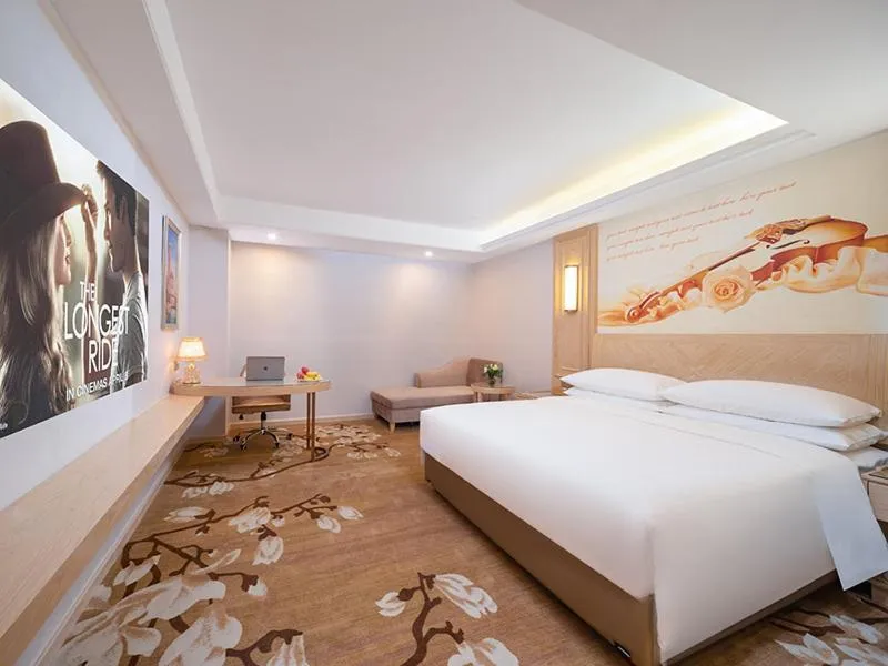 Bed in Vienna International Hotel Chongqing Yuanyangyuanboyuan