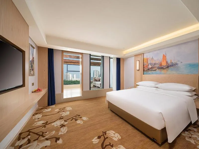 Bed in Vienna International Hotel Chongqing Yuanyangyuanboyuan