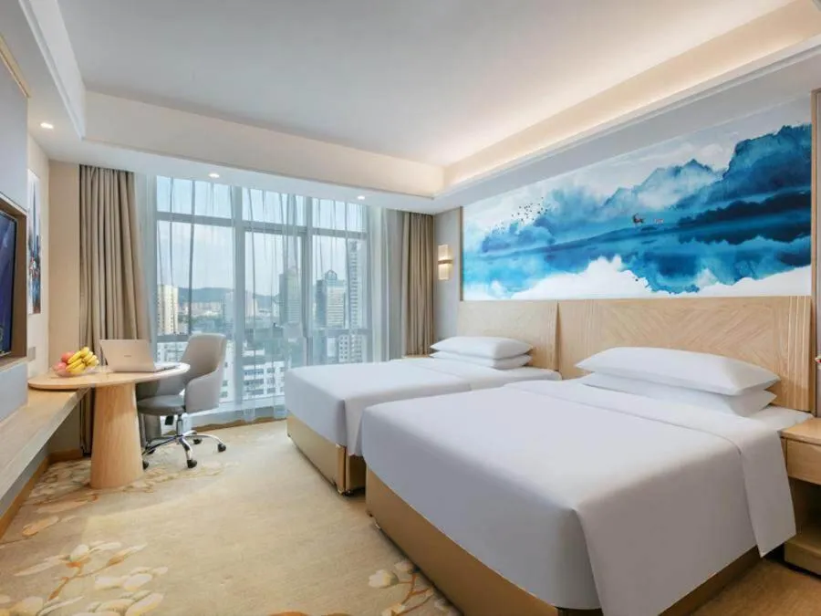 Bed in Vienna International Hotel Taizhou Wenling Branch