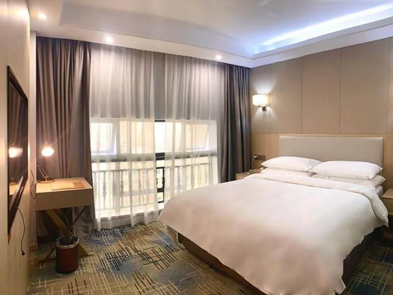 Bed in Vienna International Hotel Zhejiang Wenzhou Ruian Tangxia