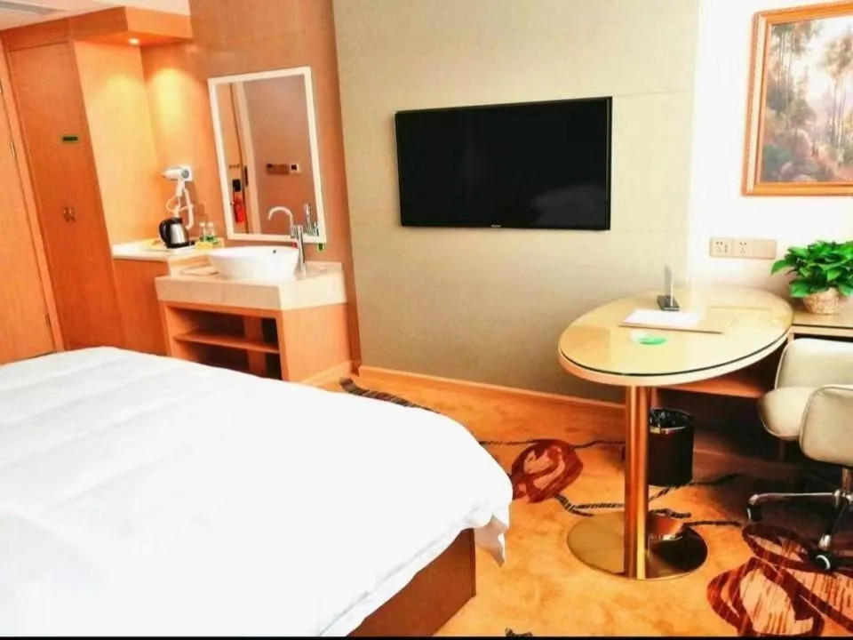 Bed in Vienna International Hotel Zhejiang Wenzhou Ruian Tangxia