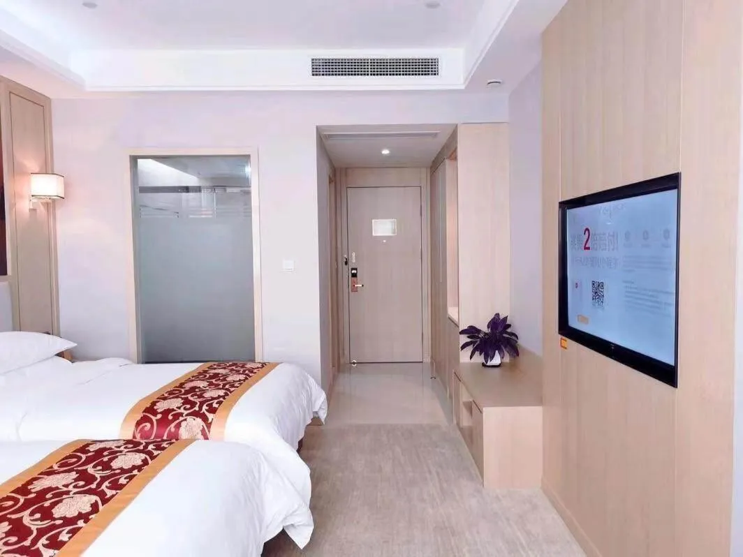 Bed in Vienna International Hotel Zhejiang Wenzhou Ruian Tangxia