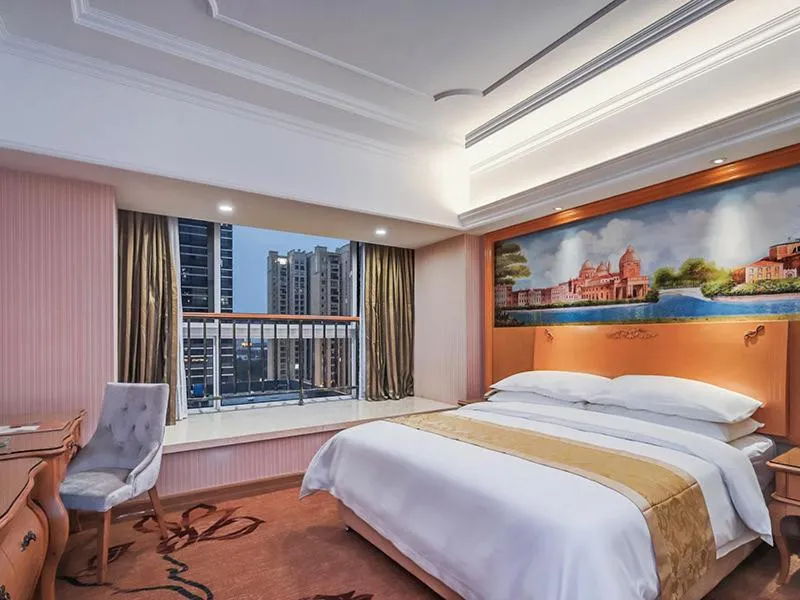 Bed in Vienna International Hotel Wuxi Huishan Yanqiao Metro Station