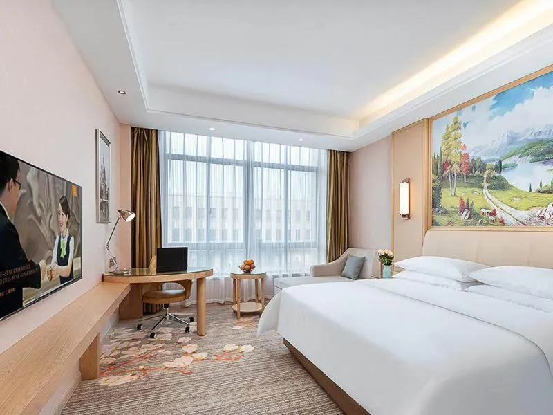 Bed in Vienna Hotel Danyang Glasses City High Speed Railway Station Dabo