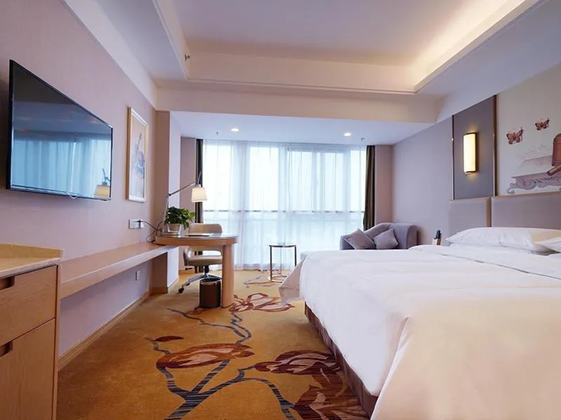 Bed in Vienna International Hotel Nanjing Dongshan Headquarters