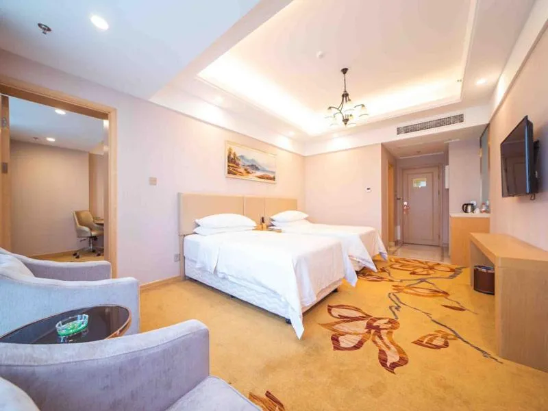 Bed in Vienna International Hotel Nanjing Dongshan Headquarters