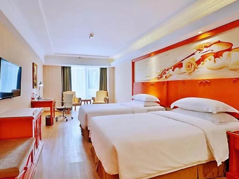 Bed in Vienna Hotel Harbin West Railway Station Wanda Plaza