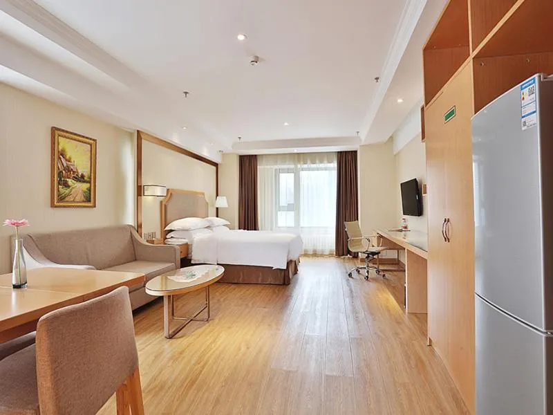 Bed in Vienna Hotel Harbin West Railway Station Wanda Plaza