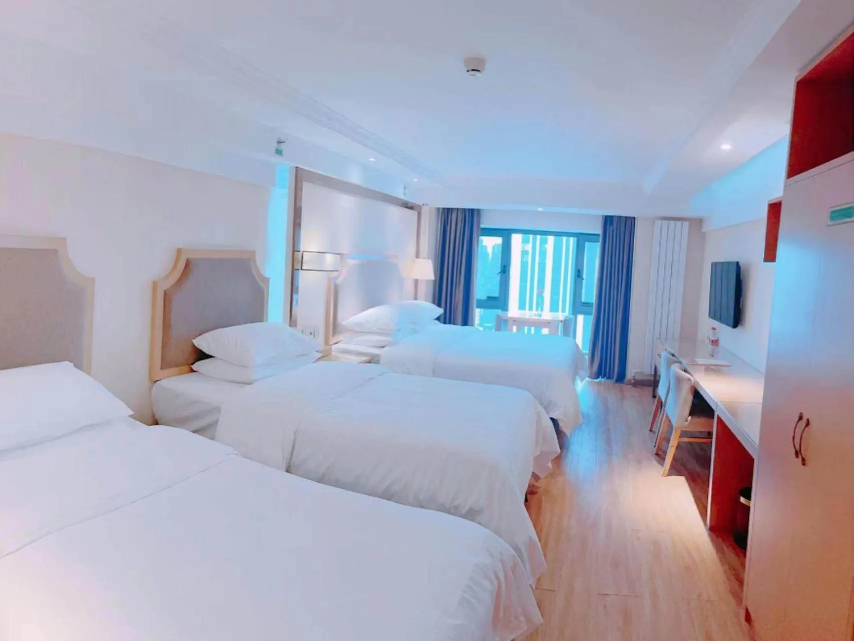 Bed in Vienna Hotel Harbin West Railway Station Wanda Plaza