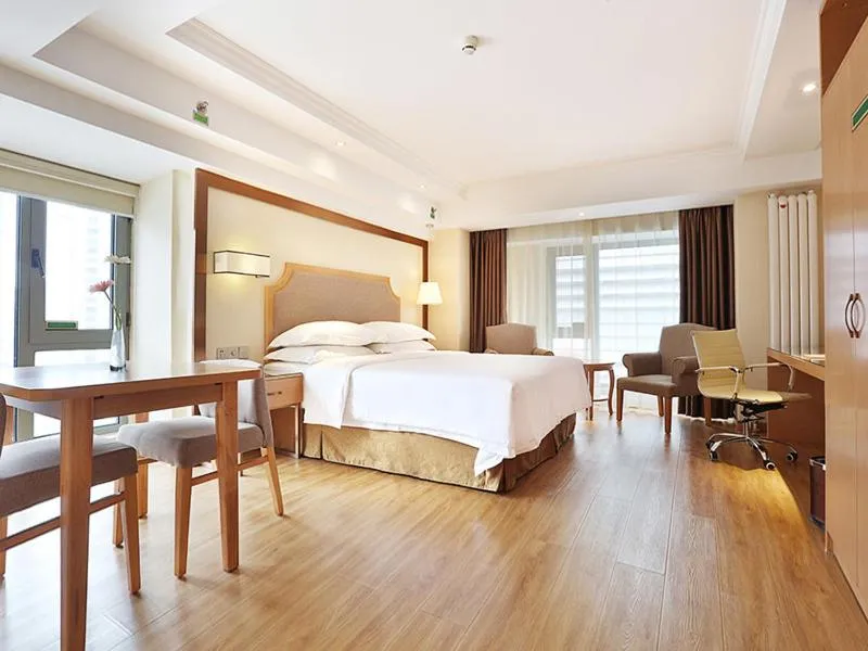 Bed in Vienna Hotel Harbin West Railway Station Wanda Plaza