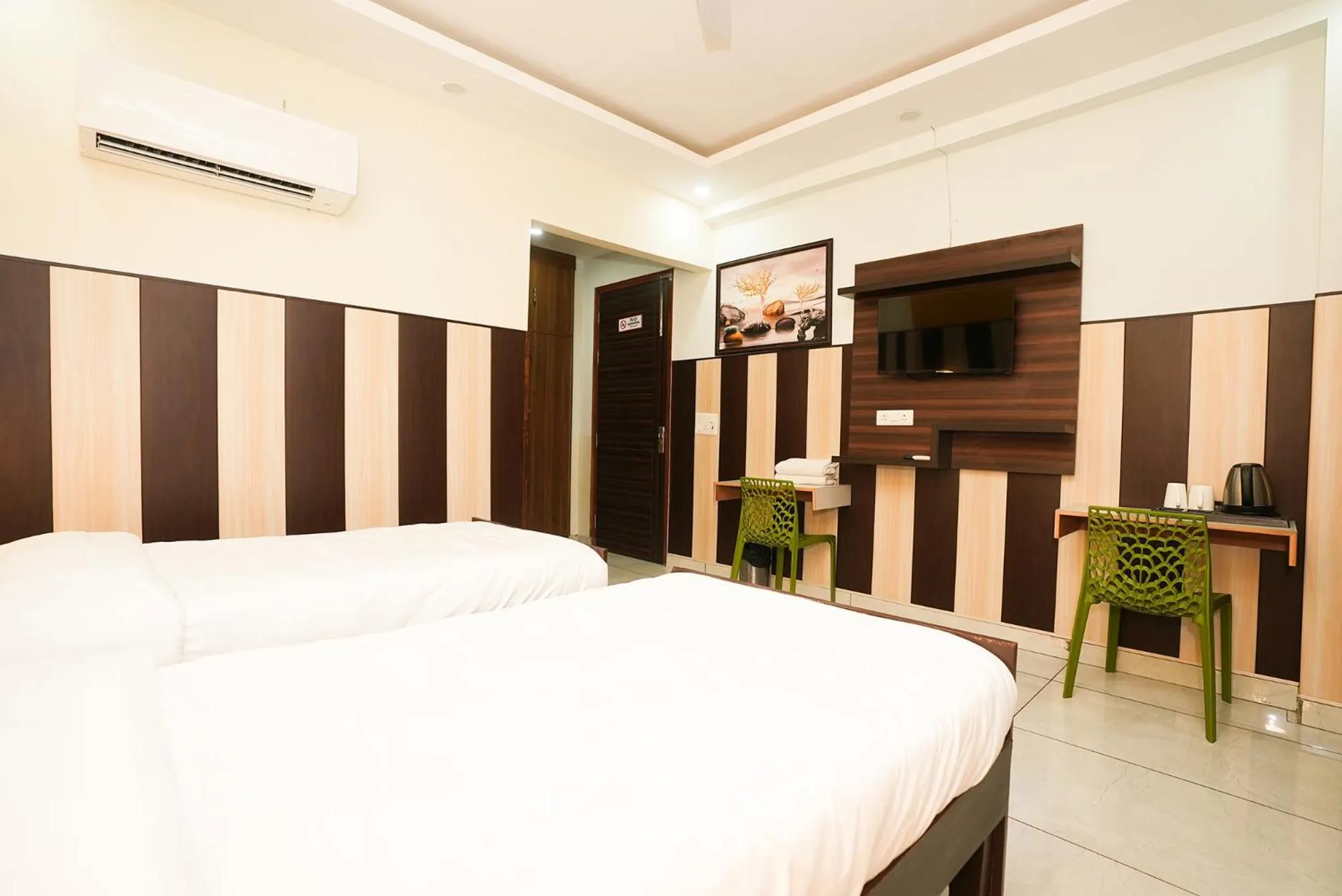 Bed in FabHotel Tanvi Premium