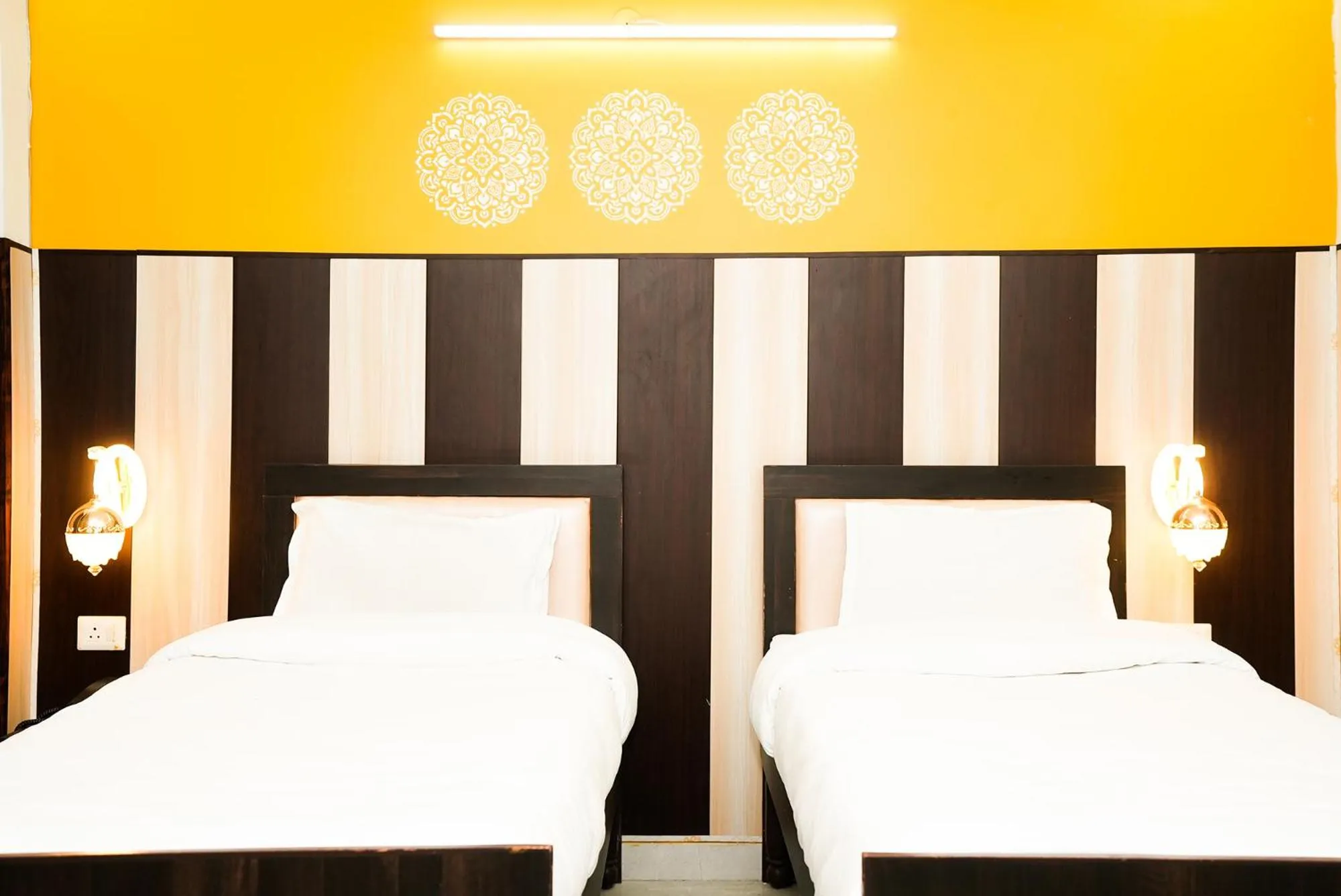 Bed in FabHotel Tanvi Premium