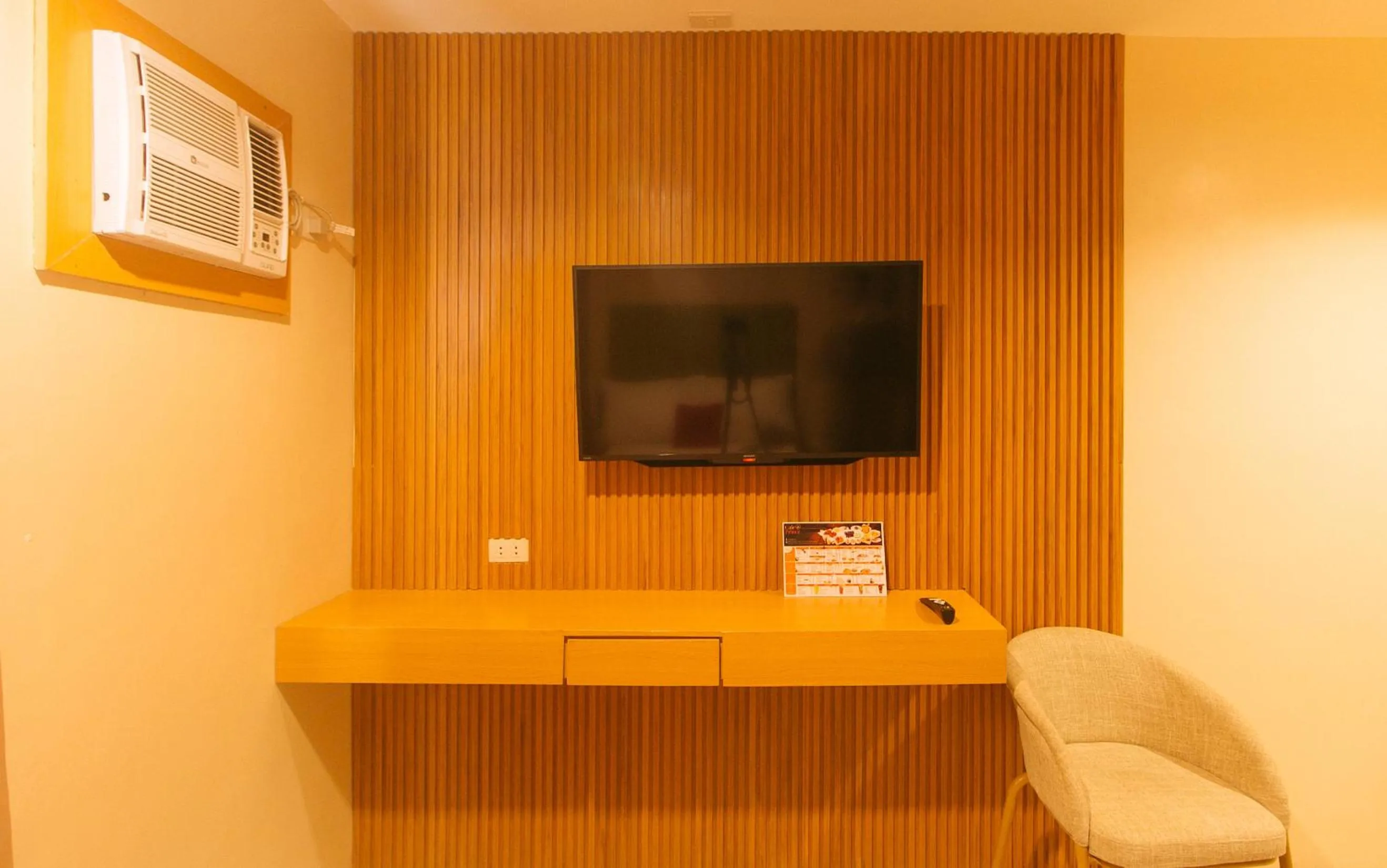 TV and multimedia in RedDoorz @ Benelio Suites Pavia Iloilo