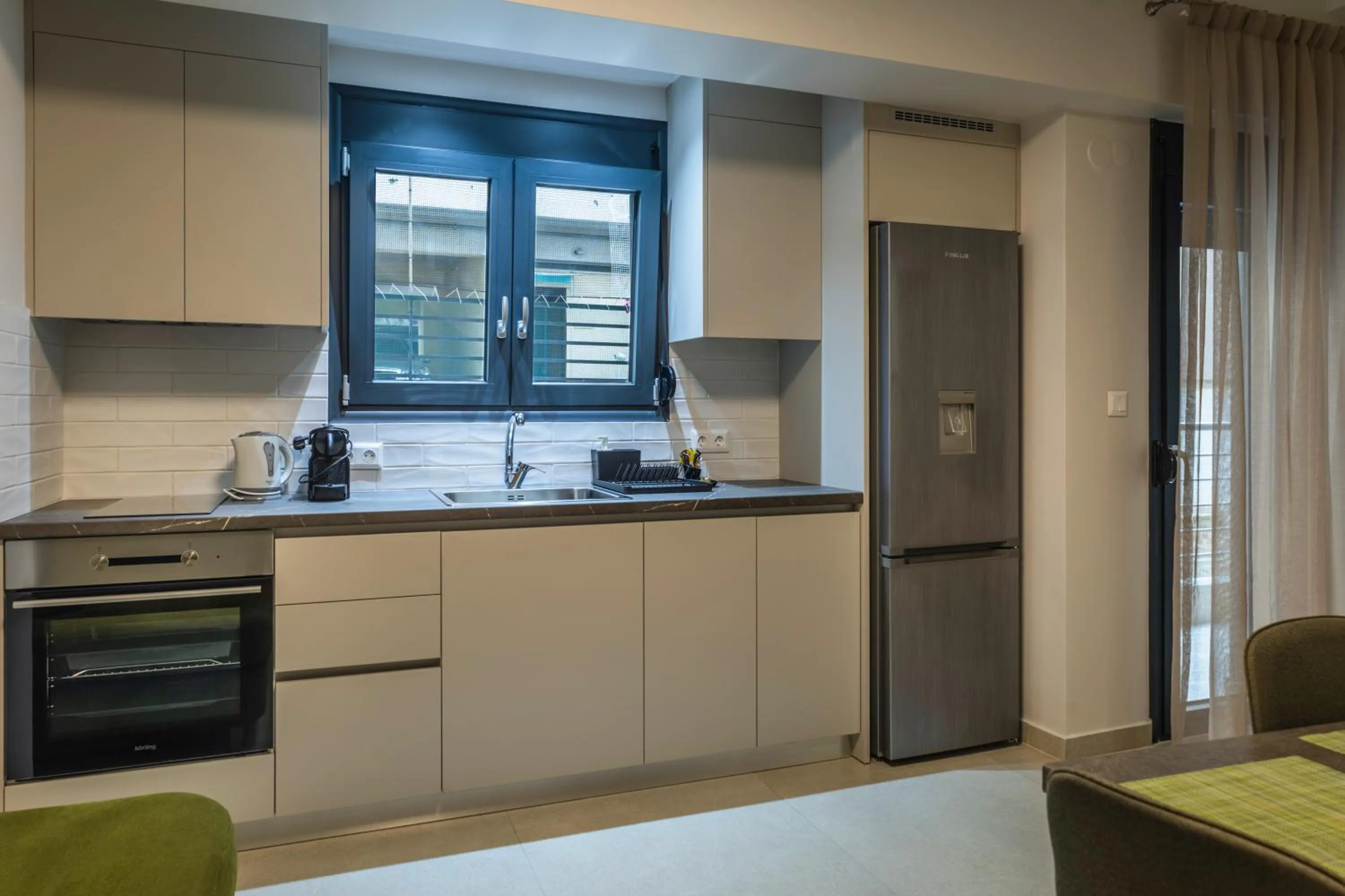 Kitchen or kitchenette in Toumba apartments