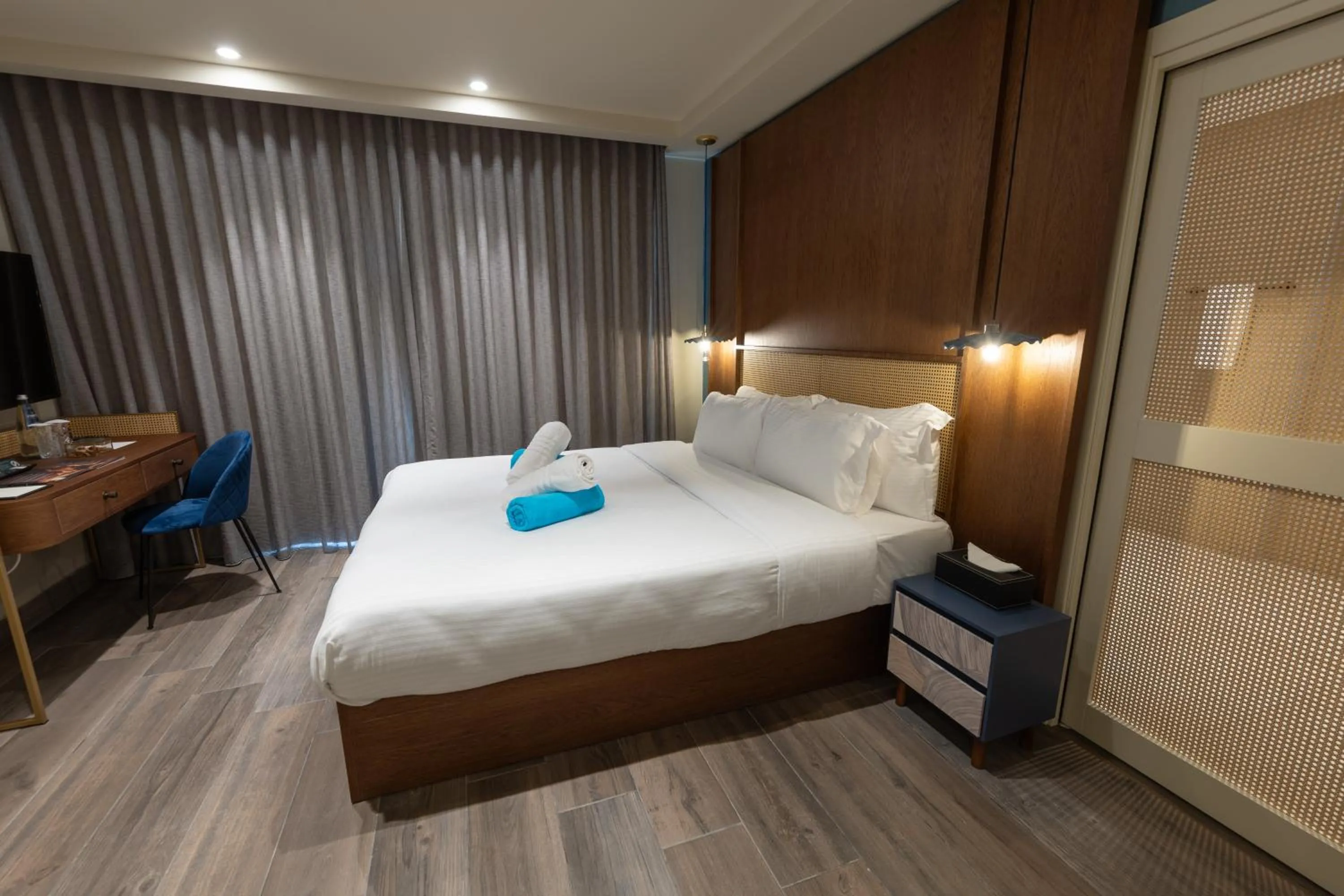 Photo of the whole room, Bed in DOMS Boutique Living