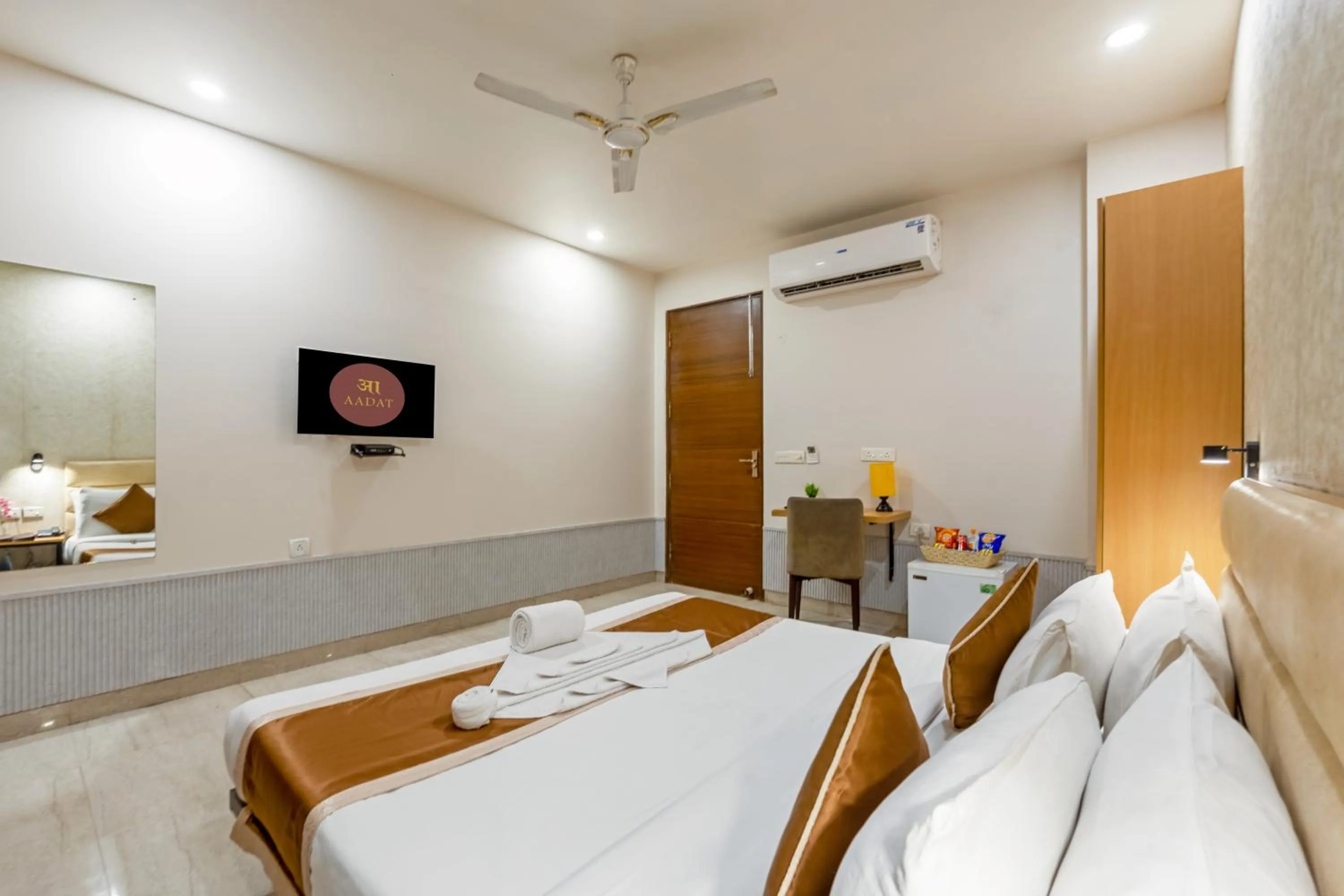 Bed in Aadat Hotel Subhash Chowk Gurgaon