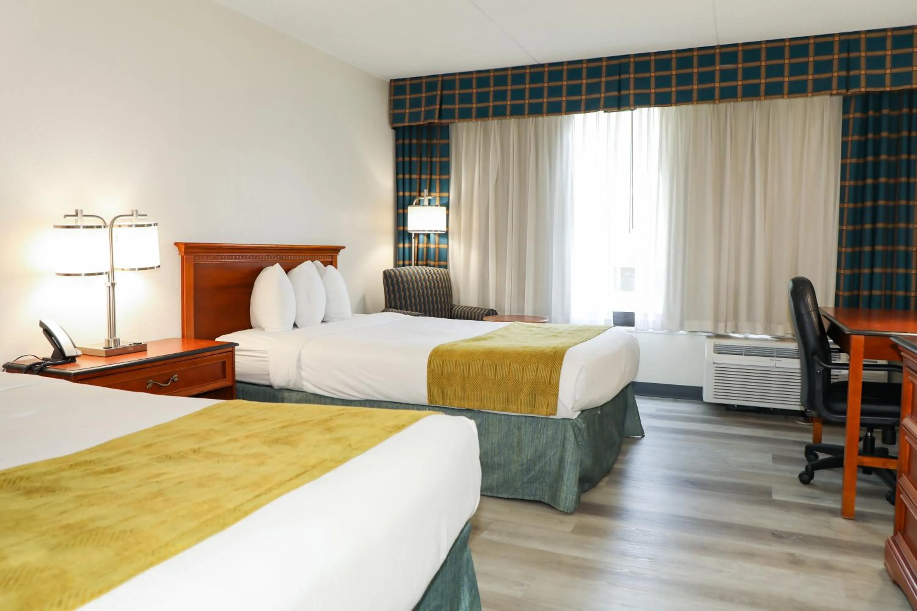 Photo of the whole room, Bed in Ramada by Wyndham Cumberland Downtown