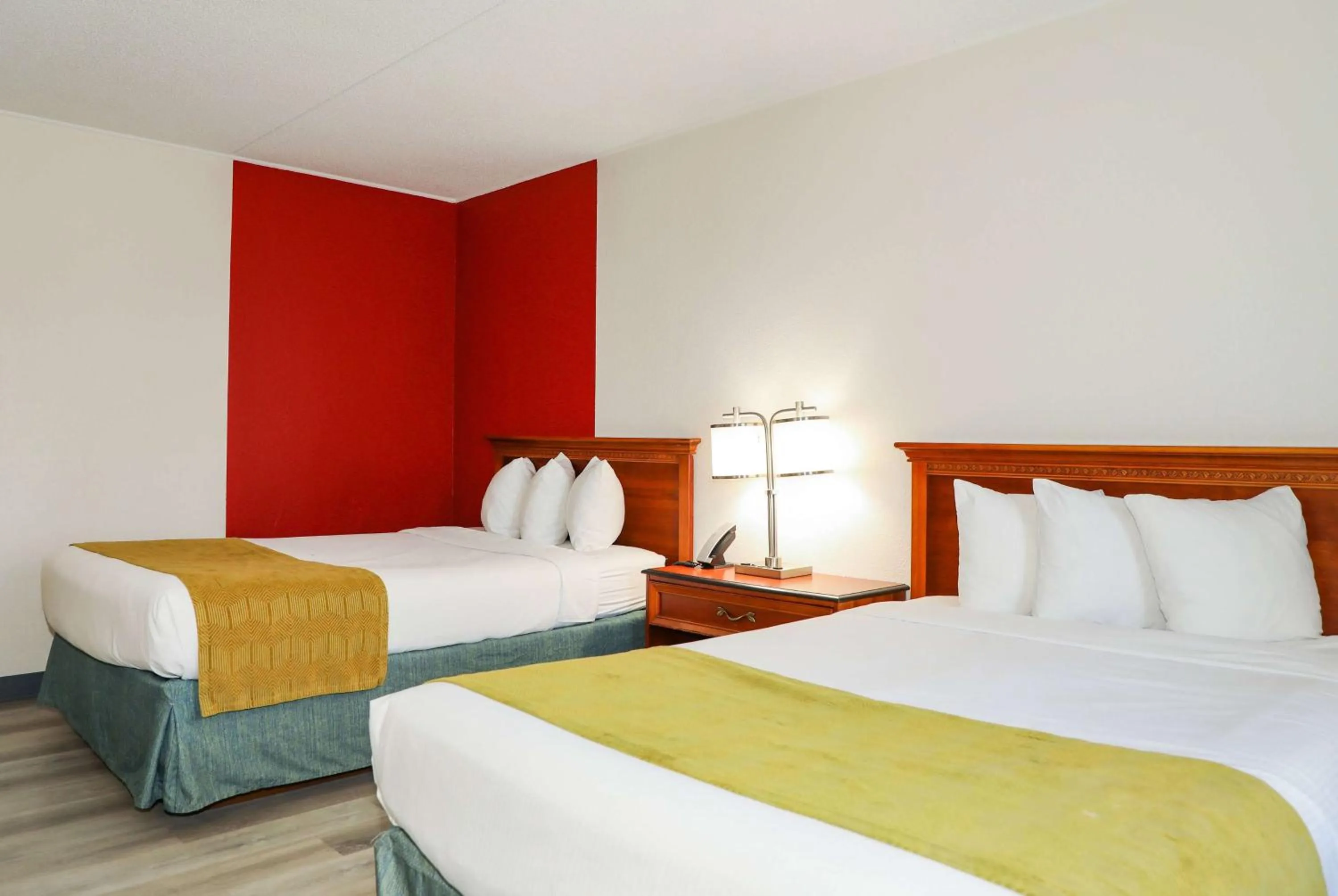 Photo of the whole room, Bed in Ramada by Wyndham Cumberland Downtown