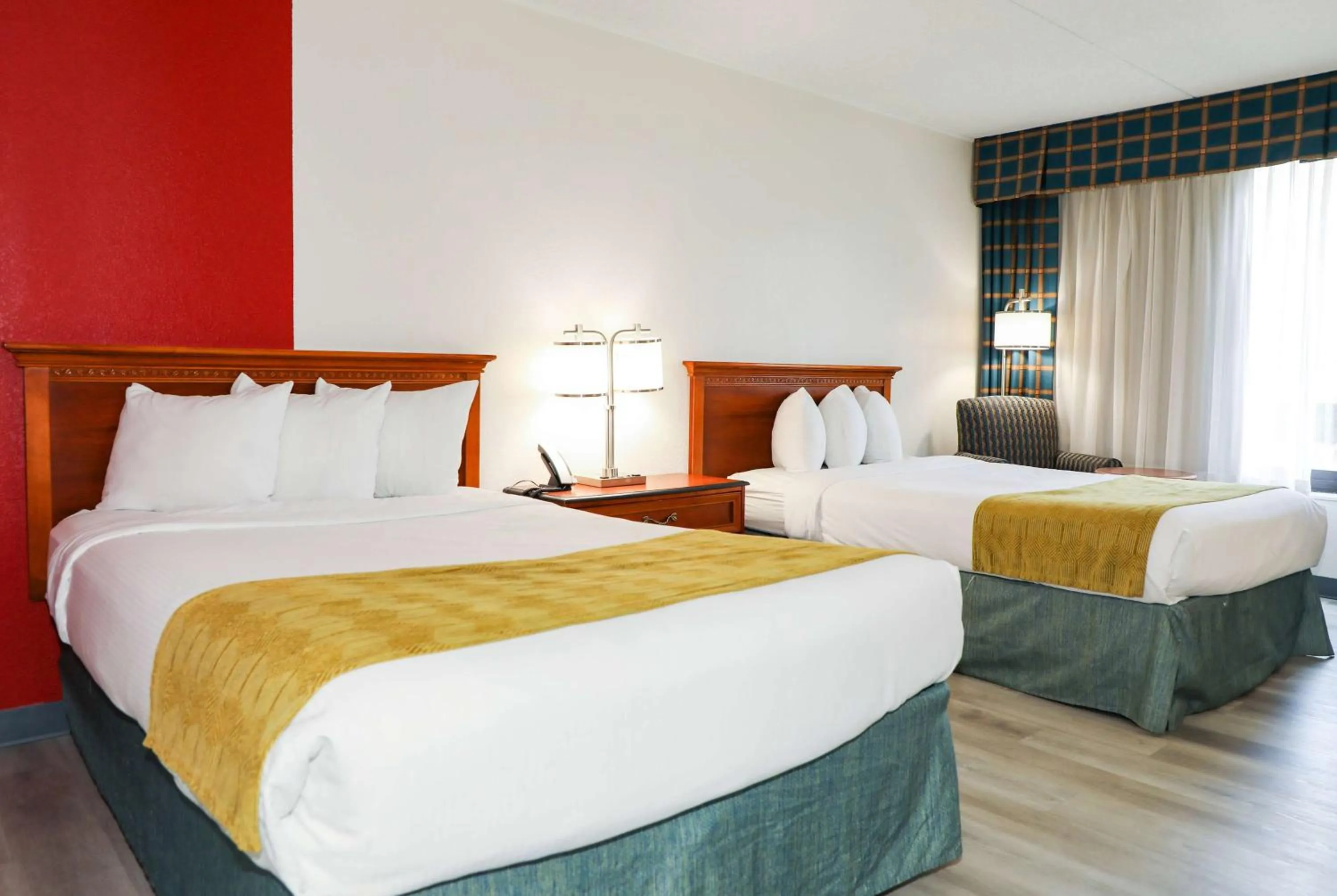 Photo of the whole room, Bed in Ramada by Wyndham Cumberland Downtown