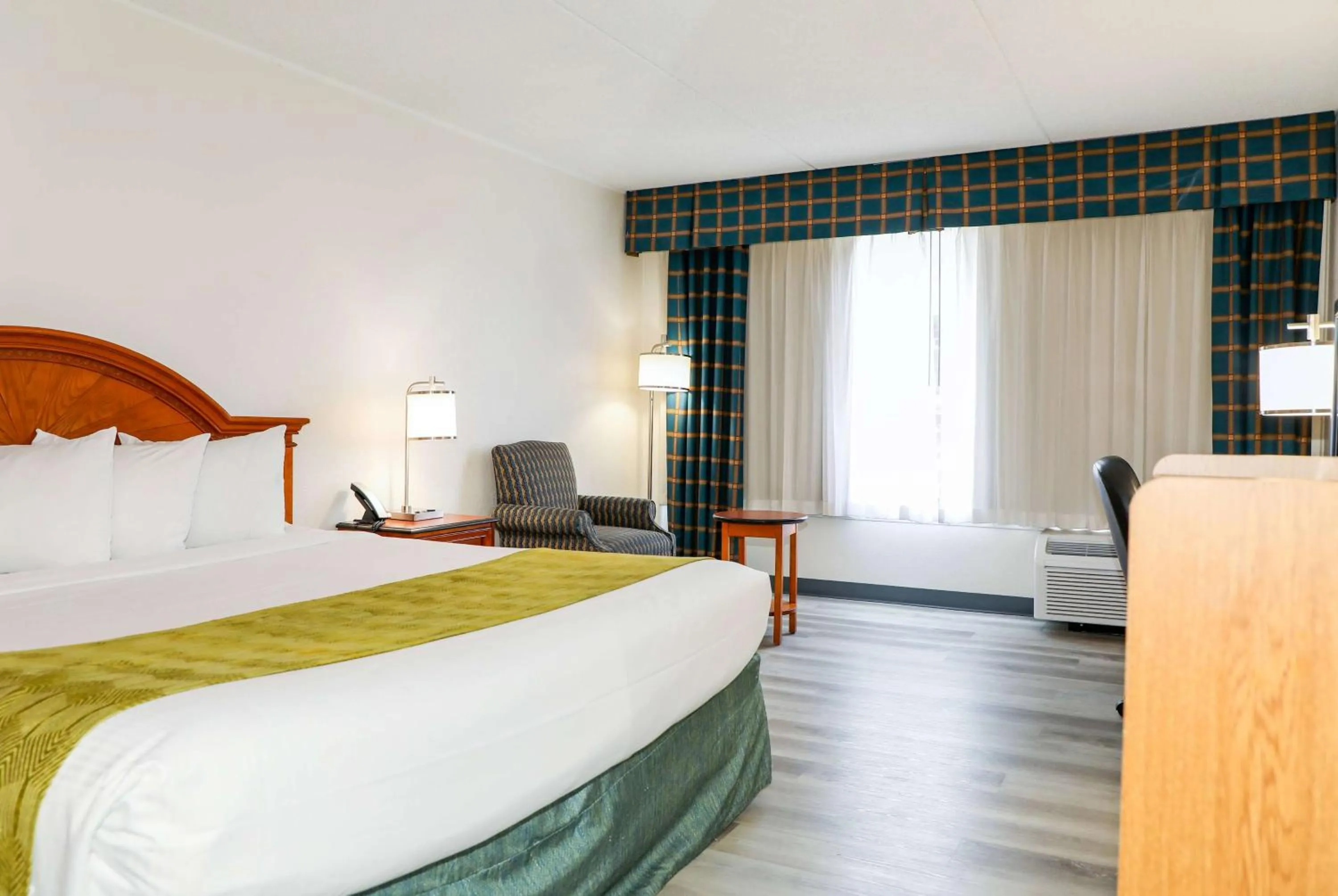 Photo of the whole room, Bed in Ramada by Wyndham Cumberland Downtown