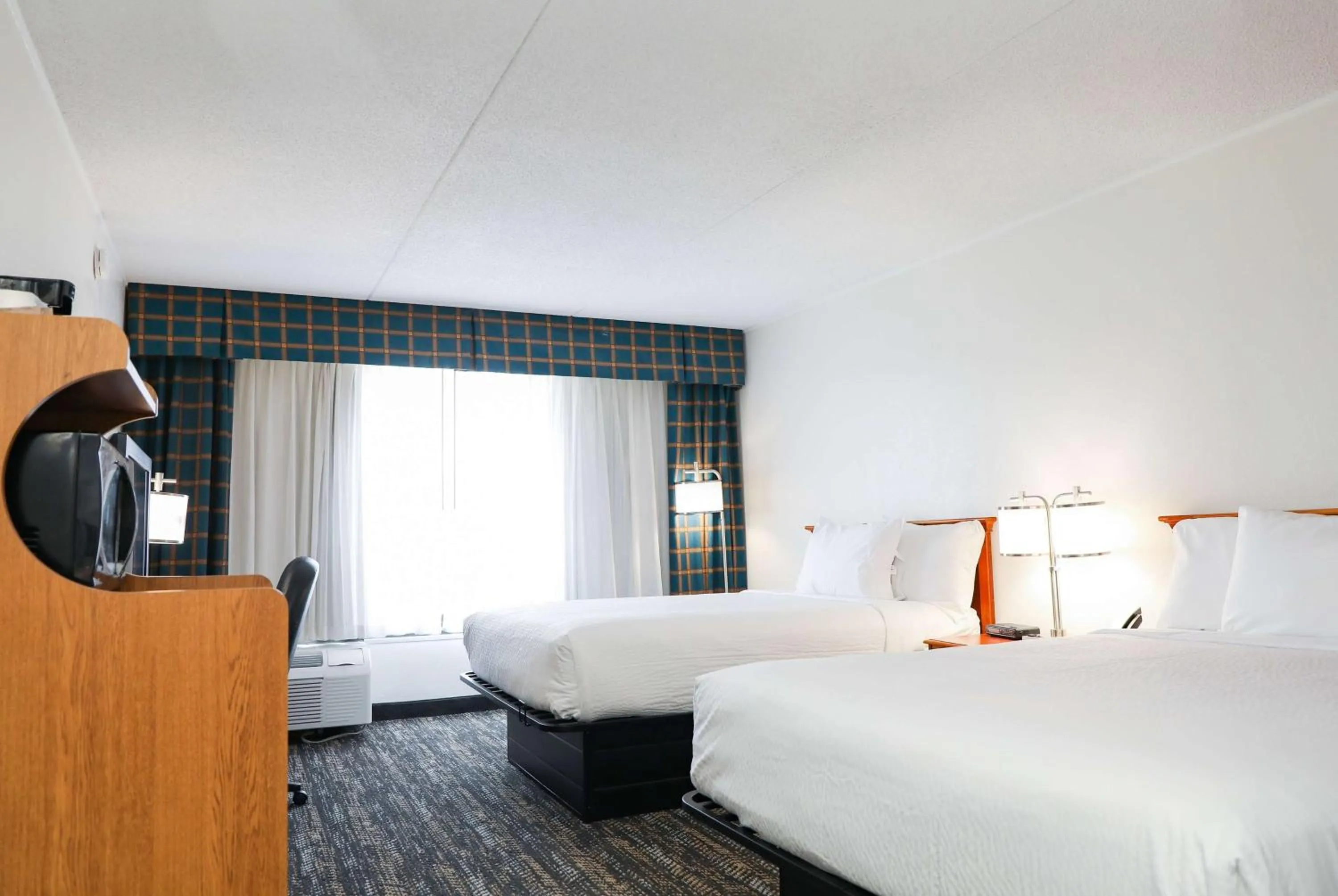 Photo of the whole room, Bed in Ramada by Wyndham Cumberland Downtown